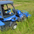 flail mower attachment for mini loader in action